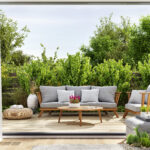 cozy patio area with garden furniture, sliding doors and decking